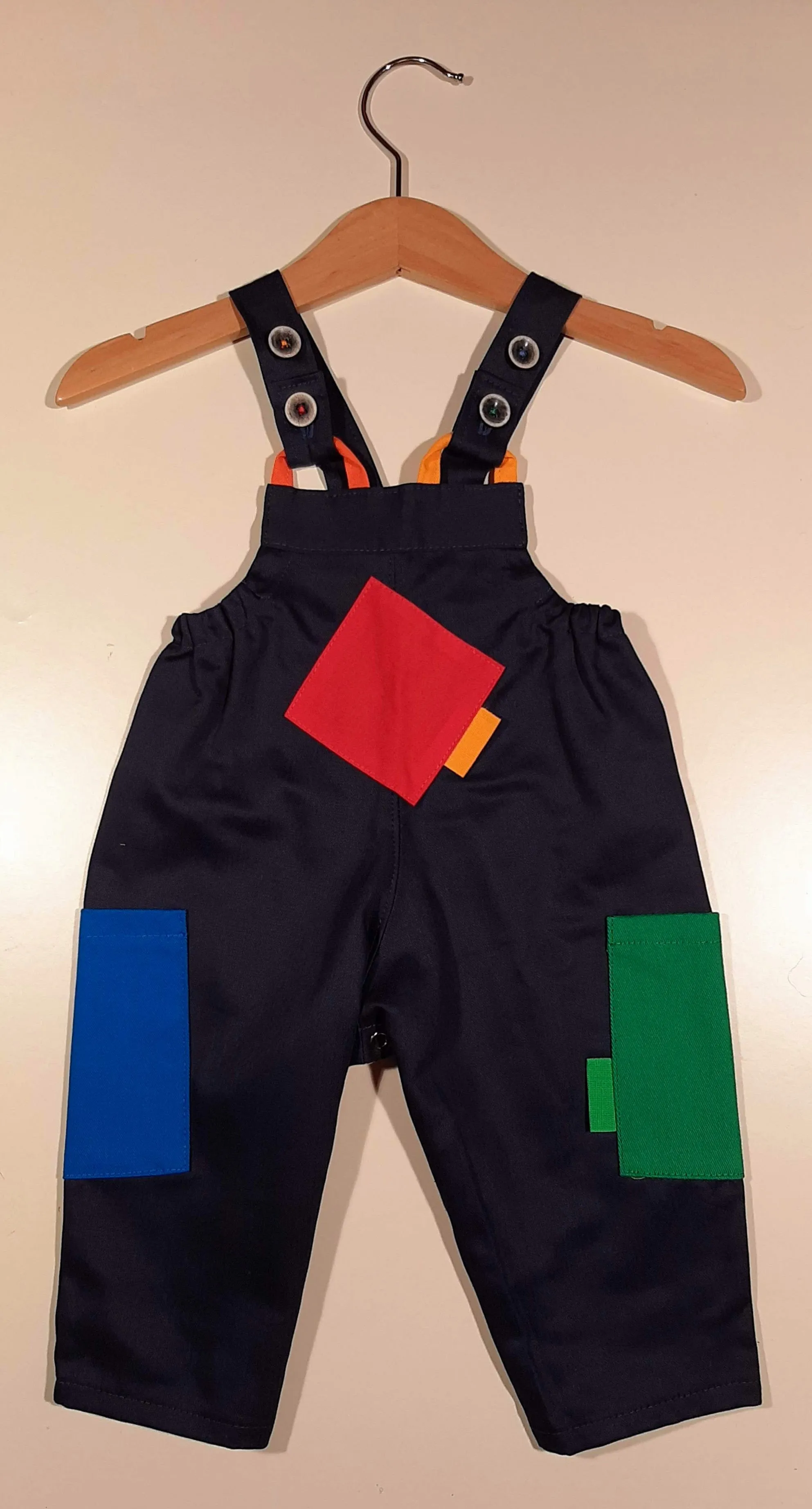 Dungaree in cotton with colored patches