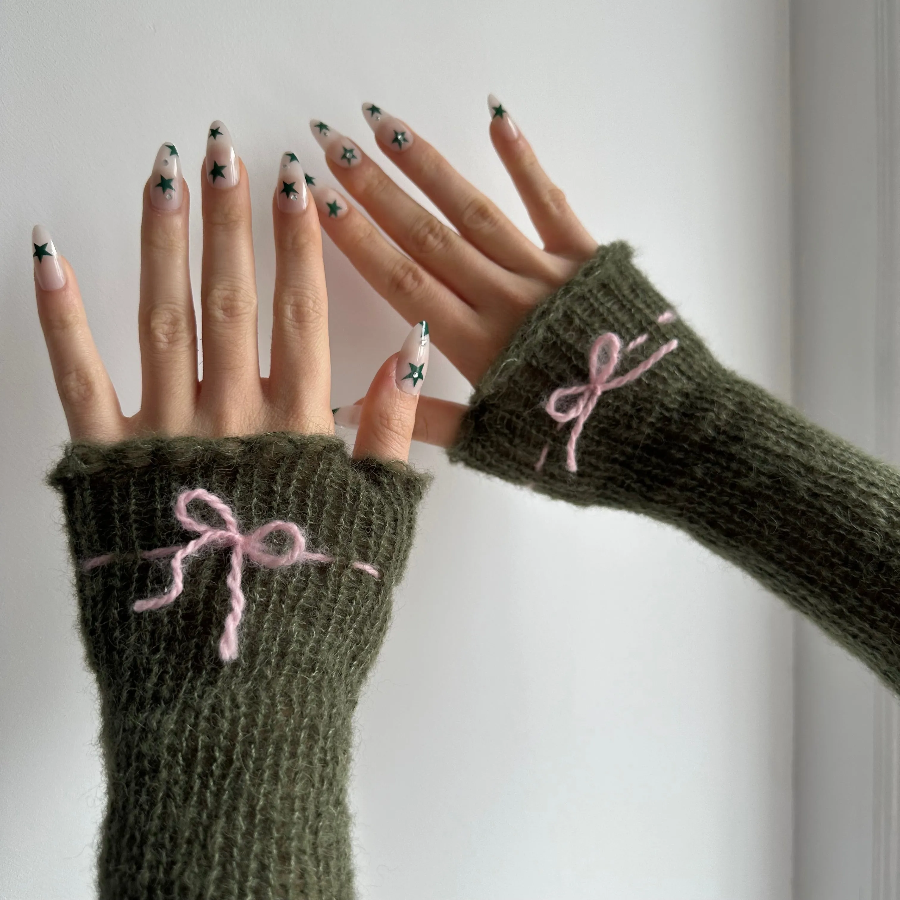 Handmade knitted mohair bow gloves in khaki green & baby pink - with thumb hole